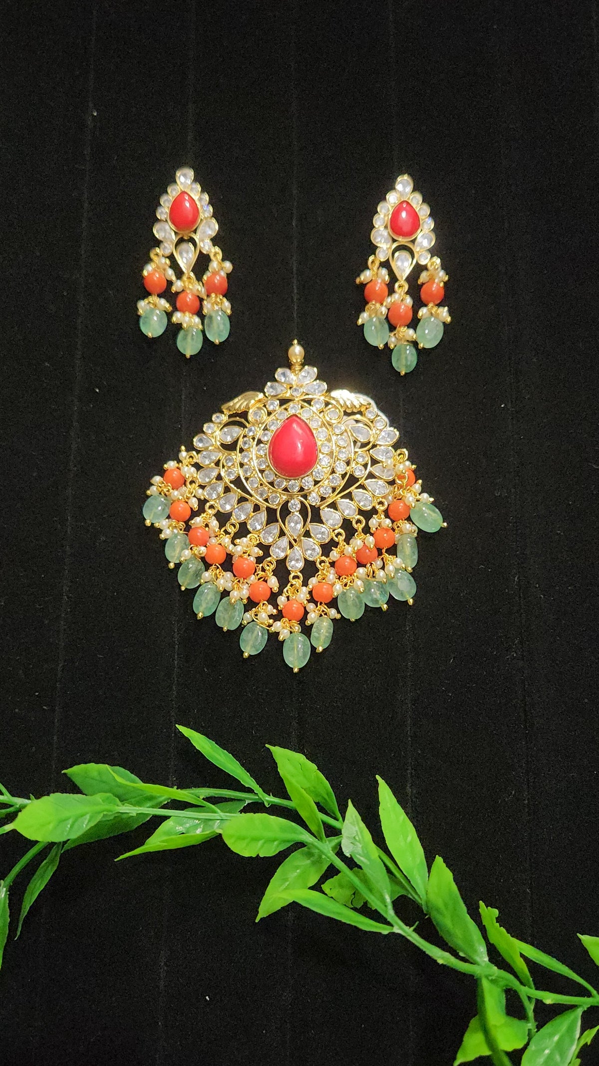 Gold Finish Polki Pendant Set with Coral & Ruby Drops
