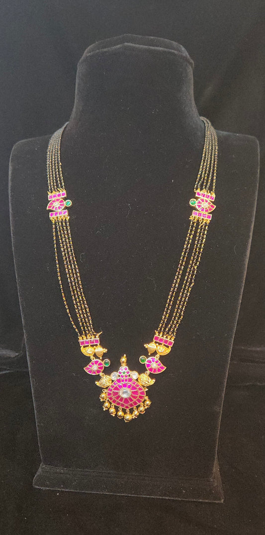 Traditional long Black Beads with kundan pendant and brooches