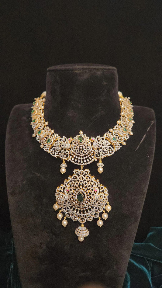 92.5 Silver Diamond Finish Peacock & Emeralds Necklace Set