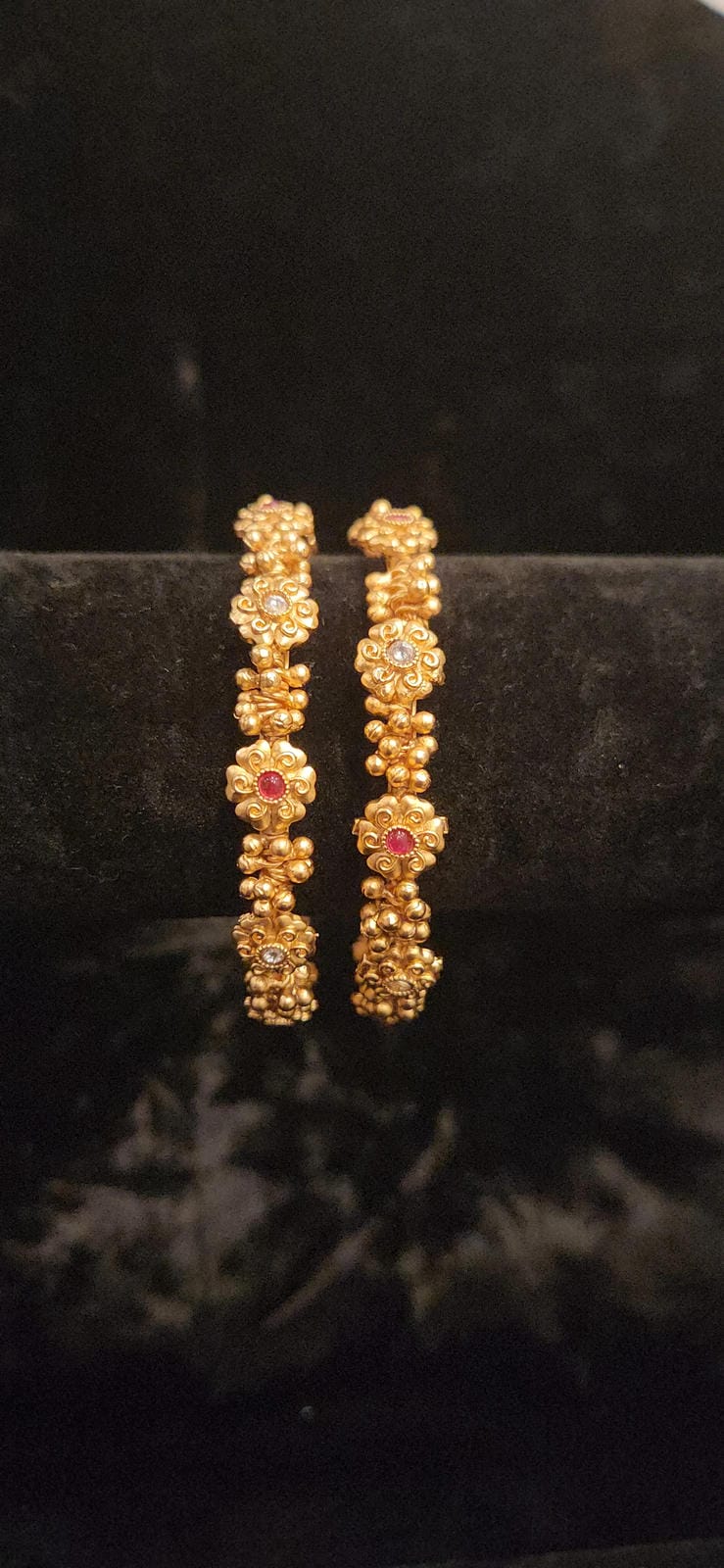 Brilliant Loreal Gold Ball Bangles