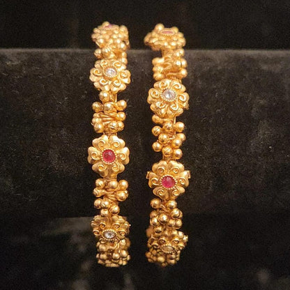 Brilliant Loreal Gold Ball Bangles