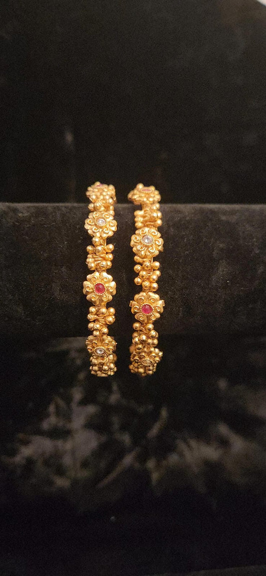 Brilliant Loreal Gold Ball Bangles