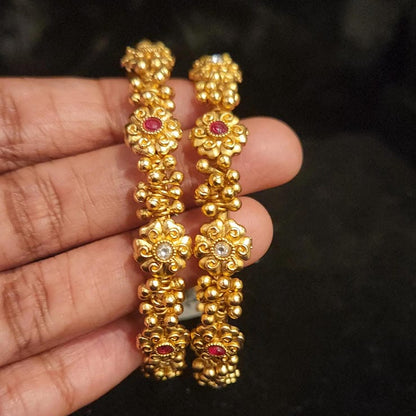 Brilliant Loreal Gold Ball Bangles