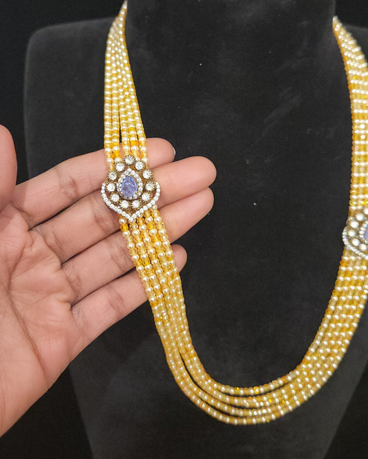 Artisan Yellow Beads Mala with Tear Drop Purple Brooches