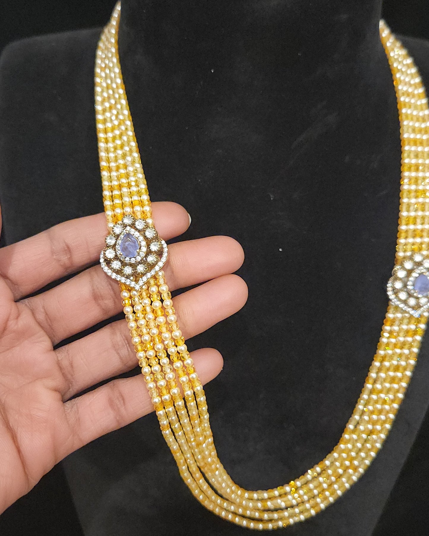 Artisan Yellow Beads Mala with Tear Drop Purple Brooches