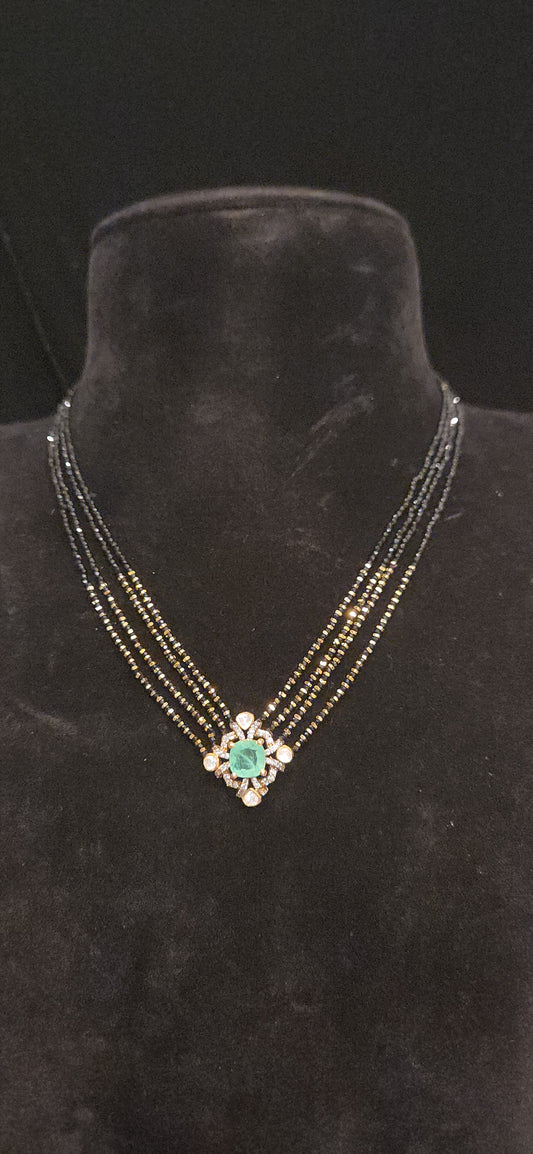 92.5 Silver Ruby Pendant Black Beads Cain