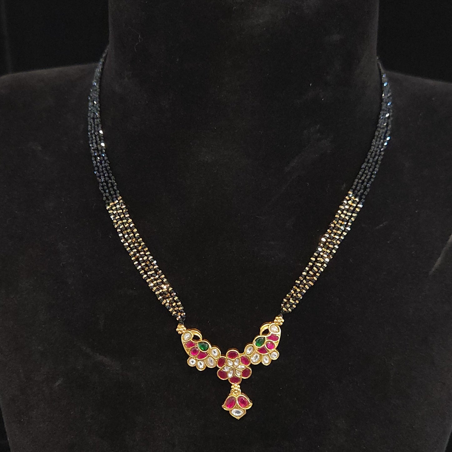 4-Layered Black Beads Chain with Kundan mango design pendant