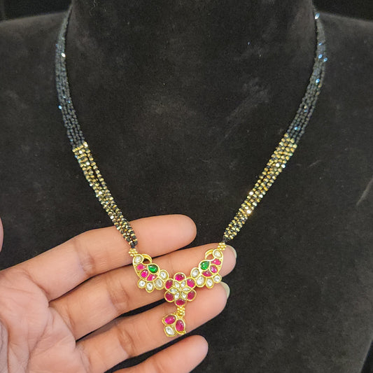 4-Layered Black Beads Chain with Kundan mango design pendant