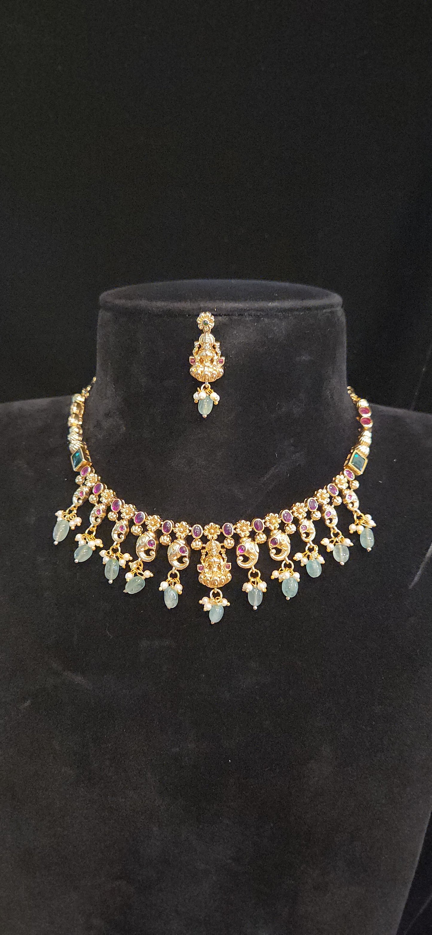 Antique Matt Finish Lakshmi Temple Simple Necklace Set with Kemp Stones