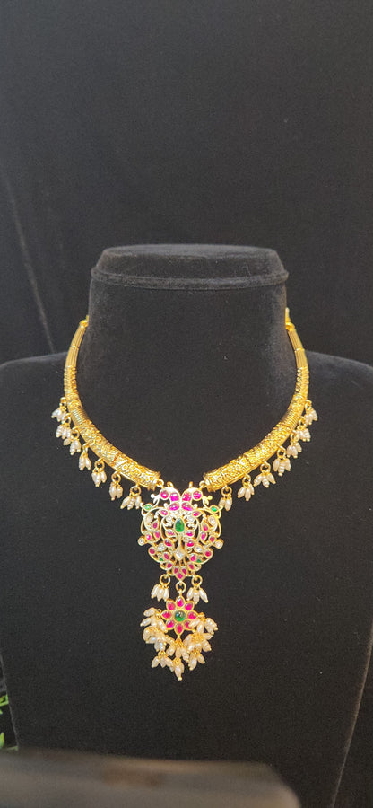 Gold Finish Peacock Kundan Kante with Pearl Hangings