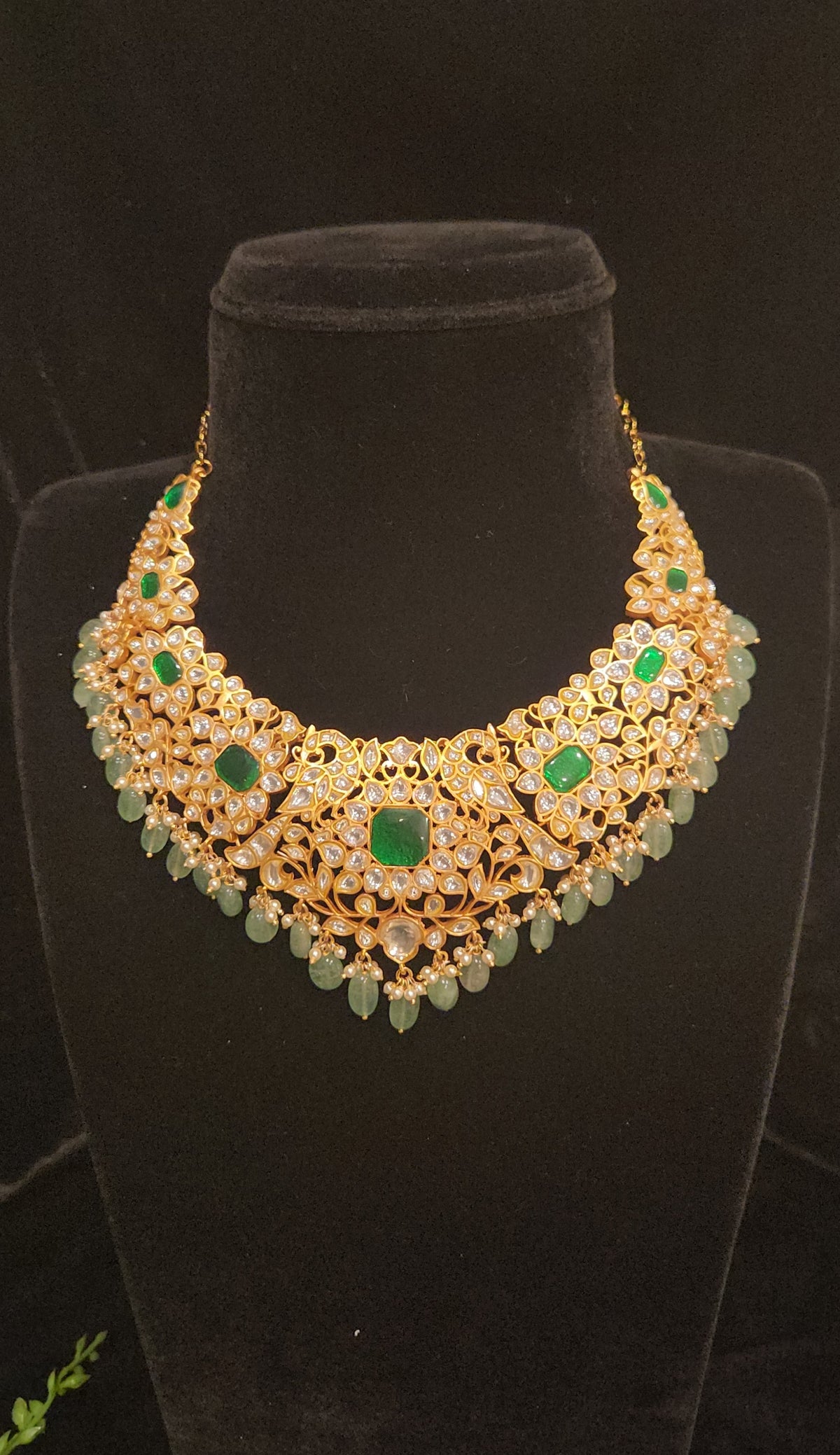 Lavish Mossanite Necklace with rich Emerald stones