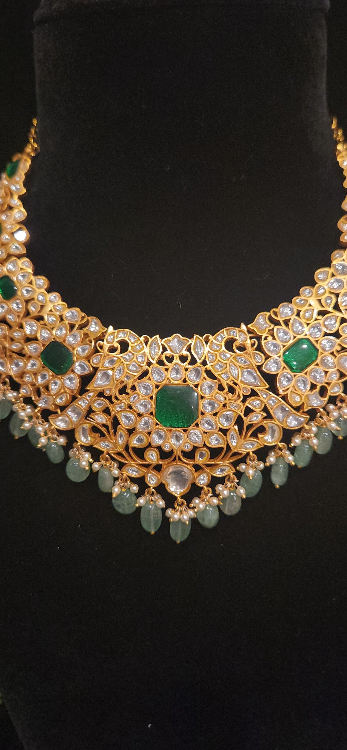 Lavish Mossanite Necklace with rich Emerald stones