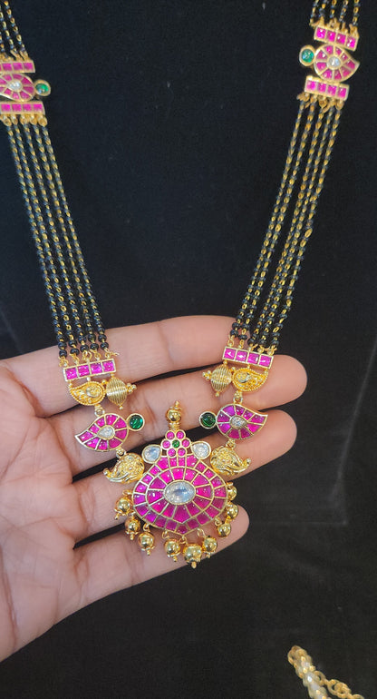 Traditional long Black Beads with kundan pendant and brooches
