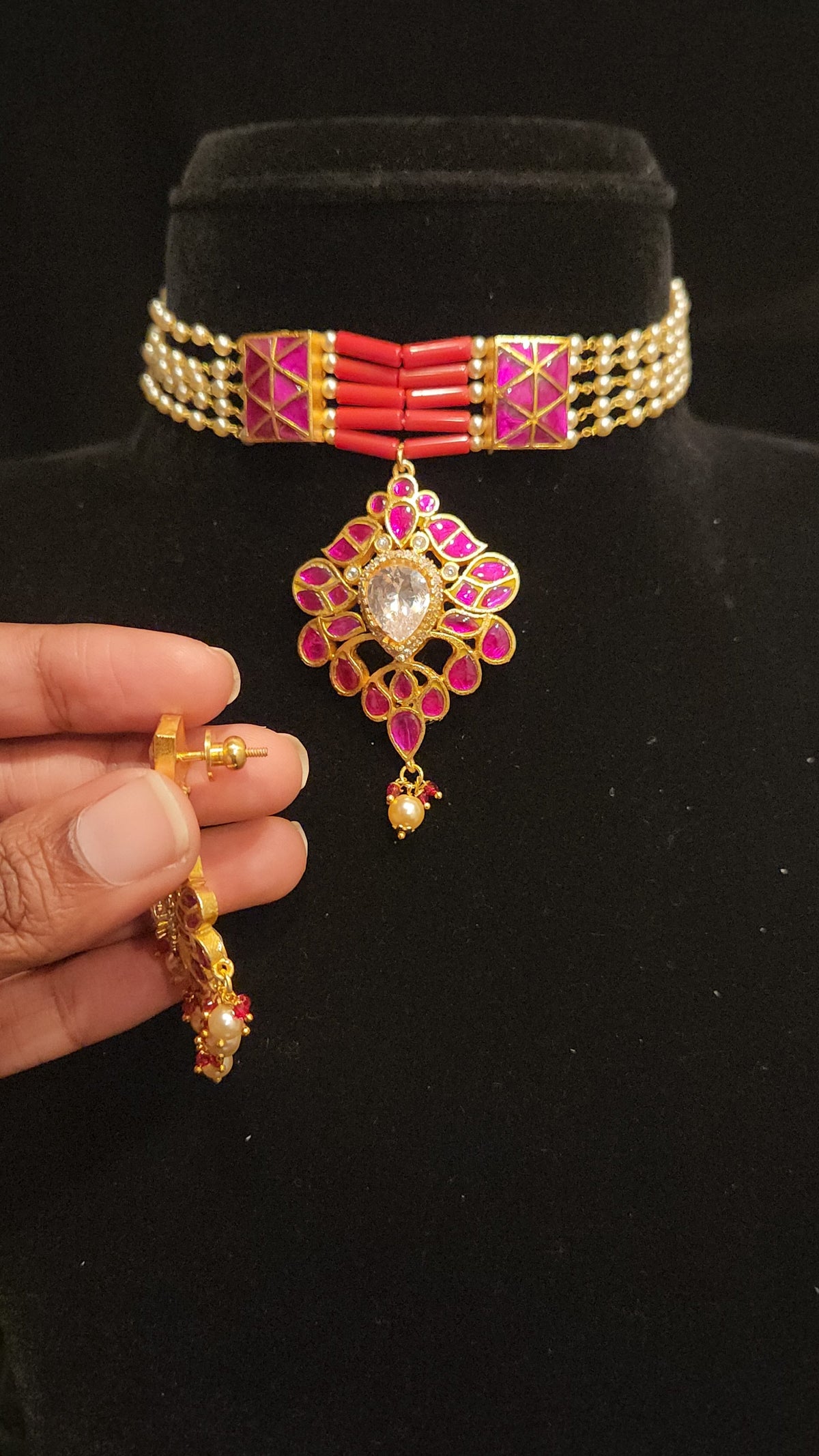 Gold Tone Kundan choker with corals and pearls