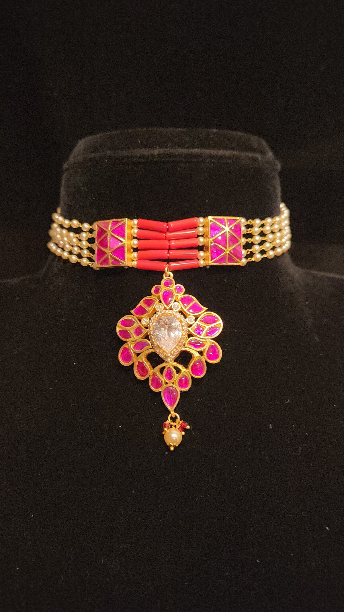 Gold Tone Kundan choker with corals and pearls