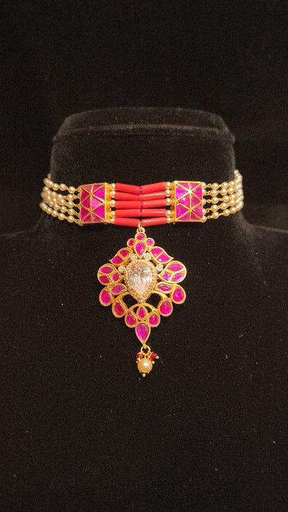 Gold Tone Kundan choker with corals and pearls