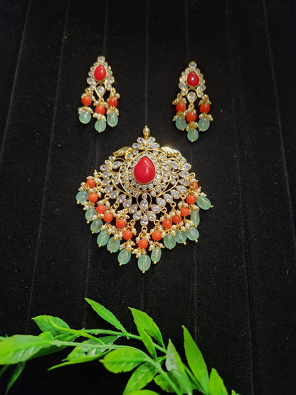 Gold Finish Polki Pendant Set with Coral & Ruby Drops