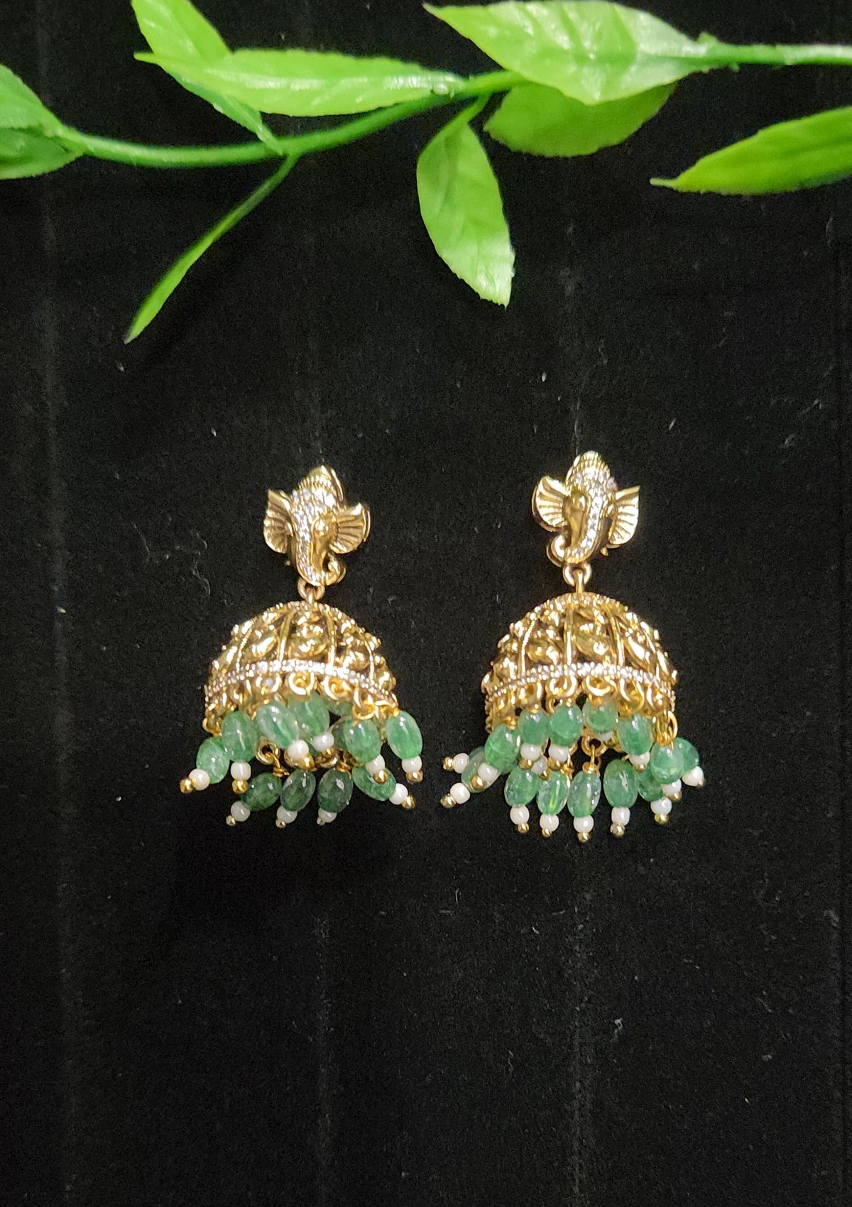 Antique Finish Ganesh Jhumka Earrings with Green Bead Drops