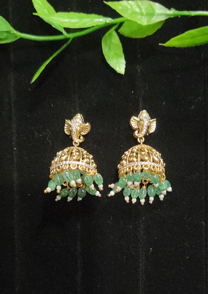 Antique Finish Ganesh Jhumka Earrings with Green Bead Drops