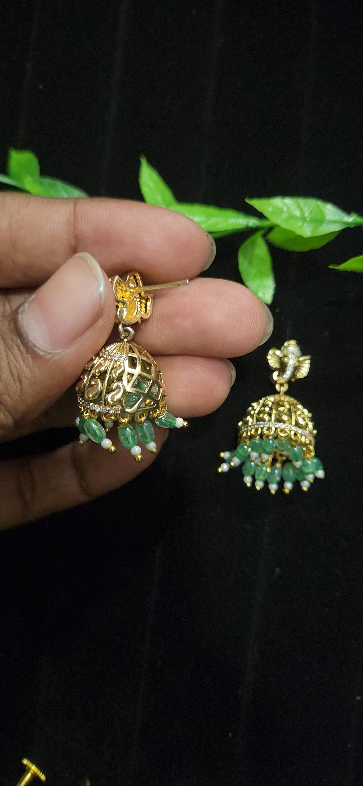 Antique Finish Ganesh Jhumka Earrings with Green Bead Drops