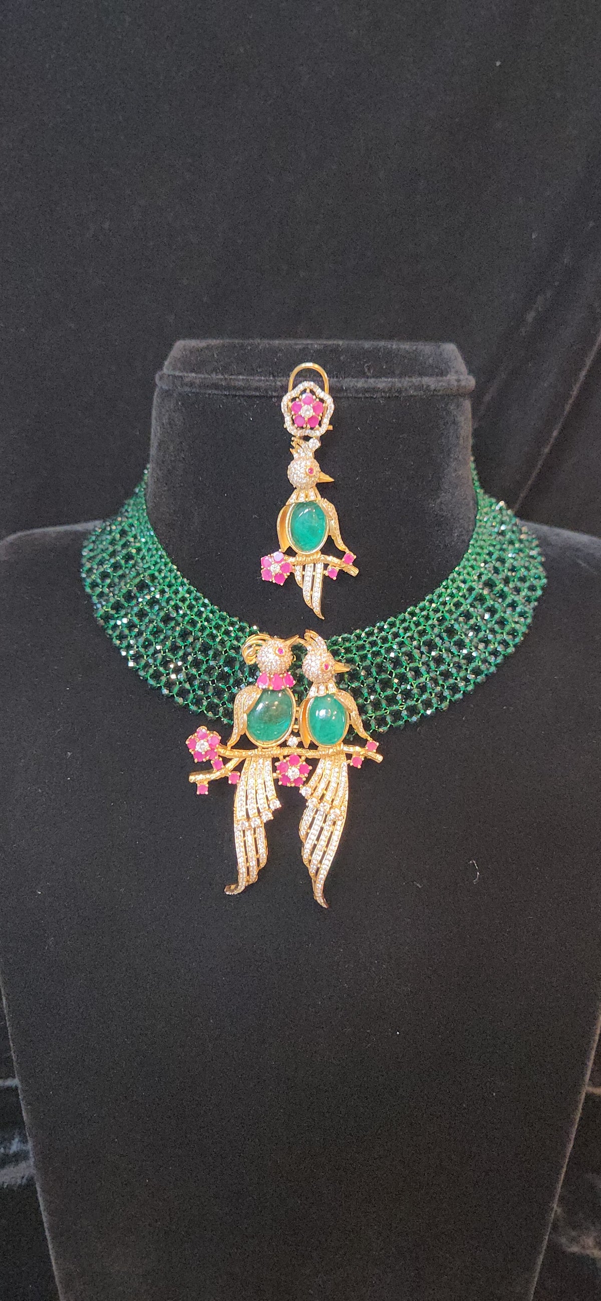 Pretty peacock themed multicolor pendant set paired with green hydro beads chain