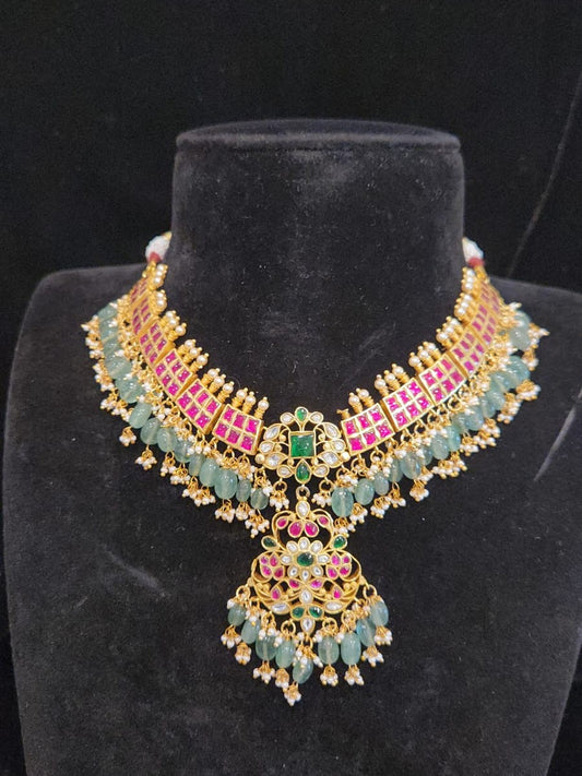 Jadau kundan neckset with strawberry carved hanging