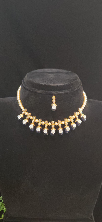 Elegant pearl necklace with pretty colored beads