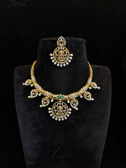 Gold Finish Hasli With Lakshmi Pendant