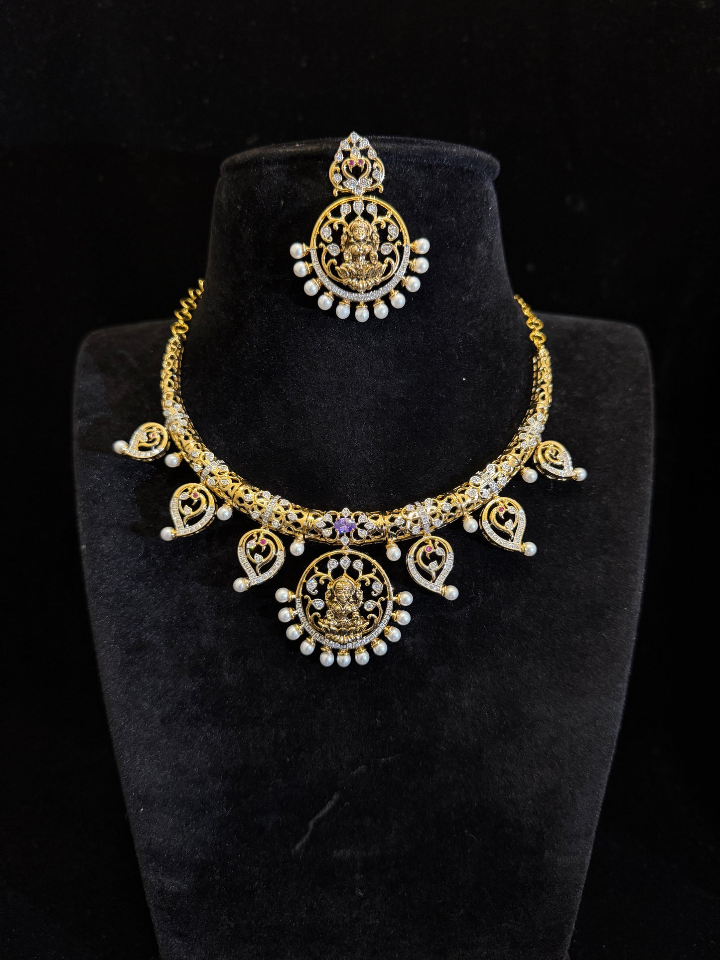 Gold Finish Hasli With Lakshmi Pendant